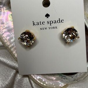 NWT Kate Spade 09868646277 post earrings with 4 prong faceted clr crystal. Gold